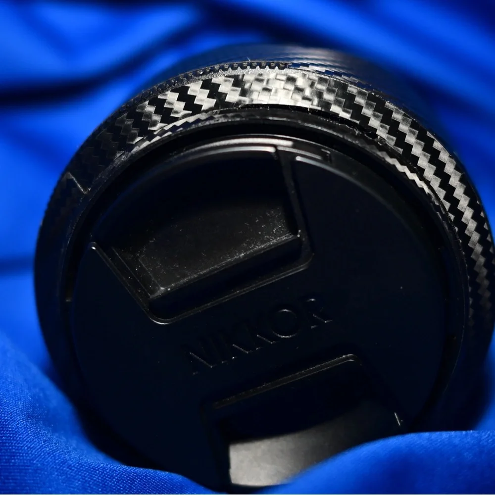 NIKKOR Z dx 50-250mm f/4.5-6.3 VR Lens with HB-90A Lens Hood & Carbon Fiber Skin